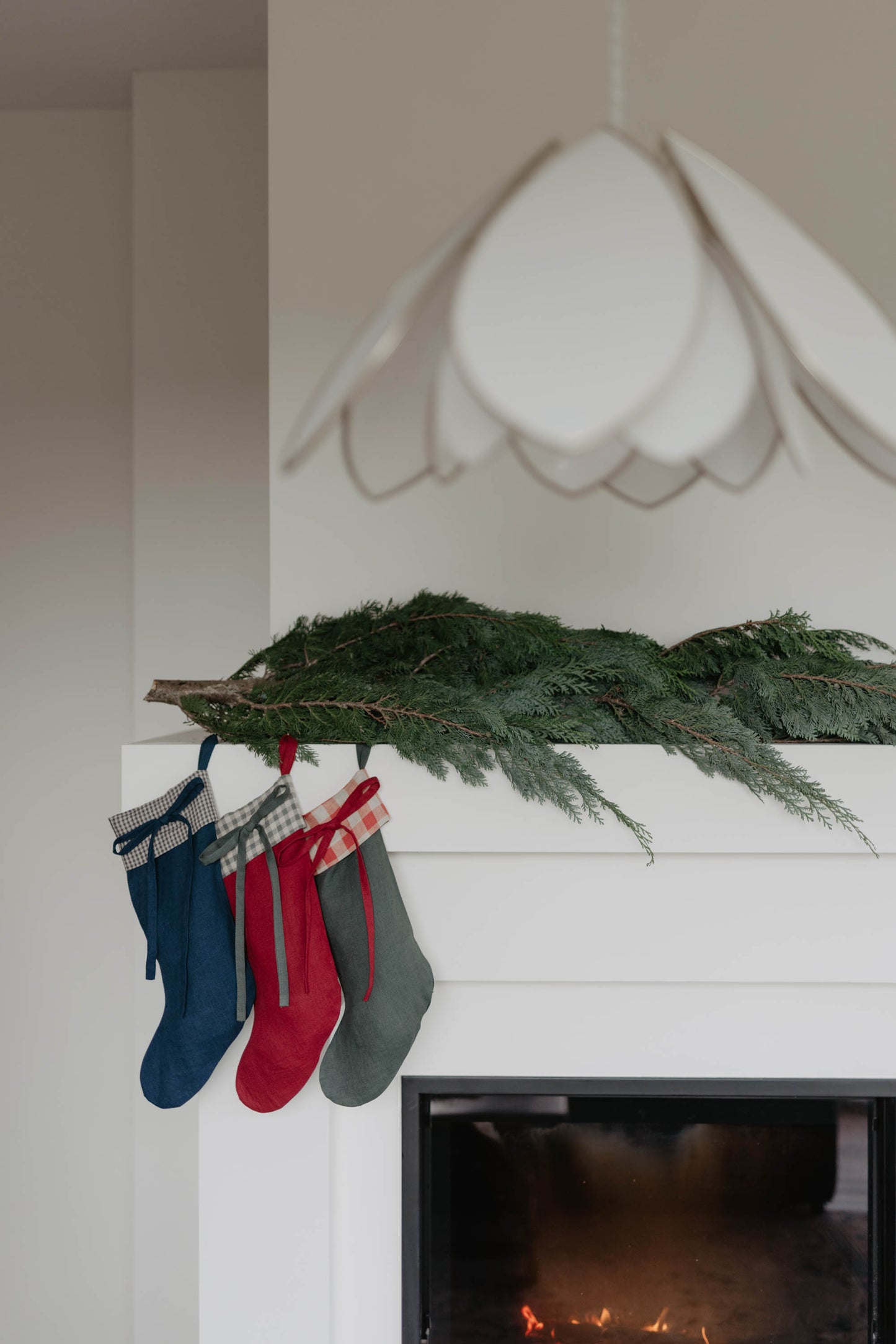 Linen Christmas Stocking with a festive bow detail