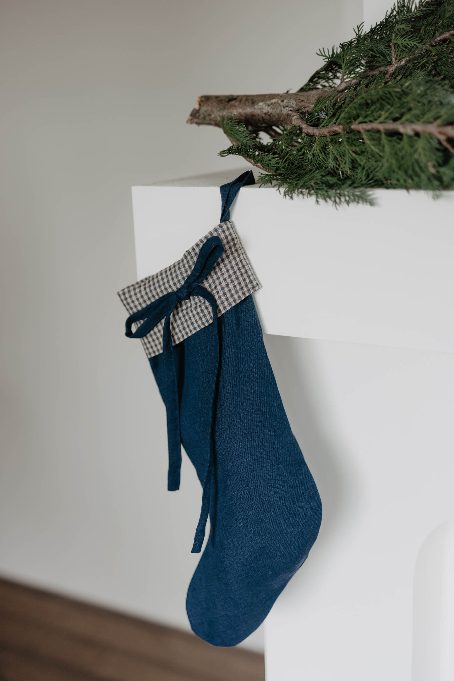 Linen Christmas Stocking with a festive bow detail