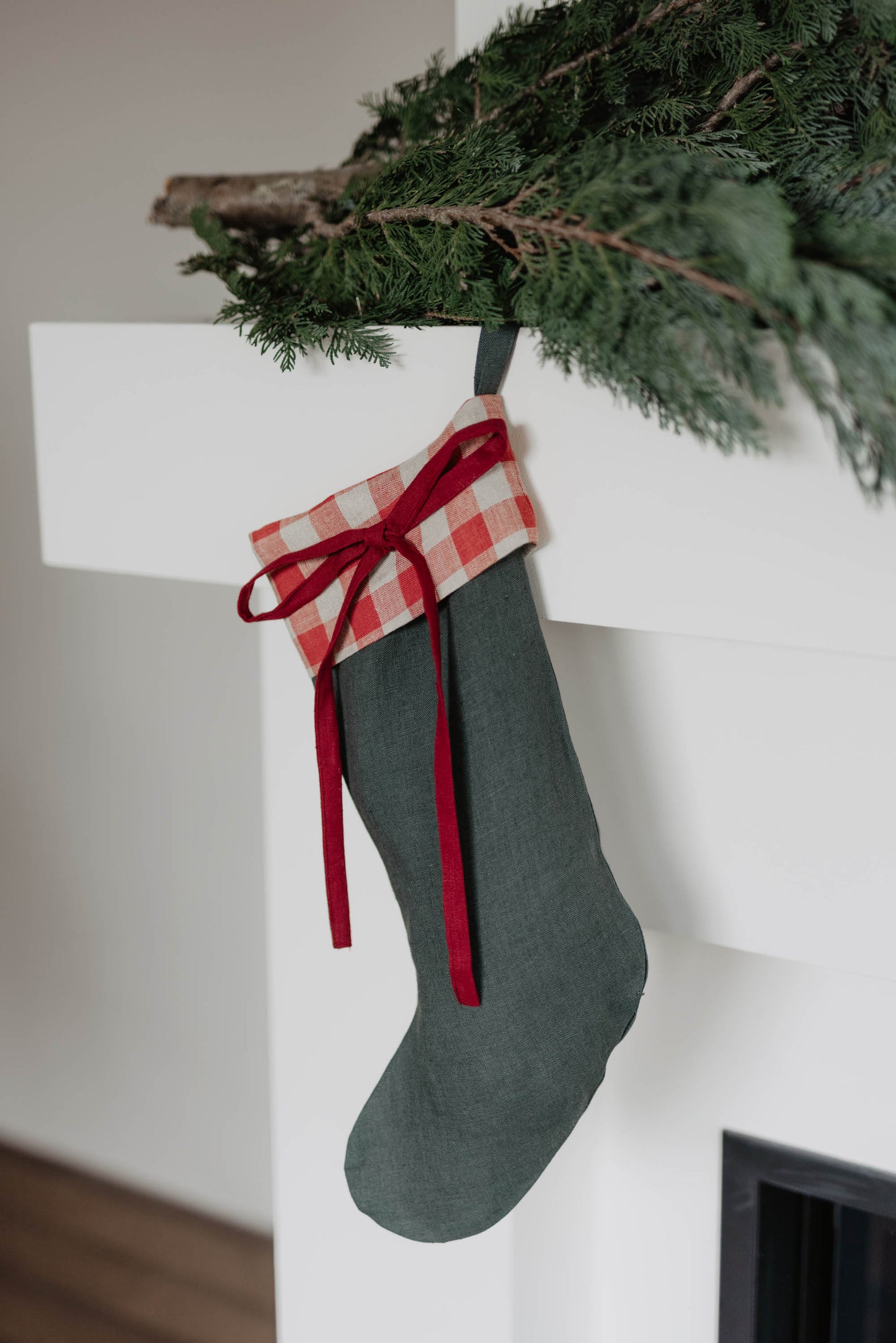 Linen Christmas Stocking with a festive bow detail