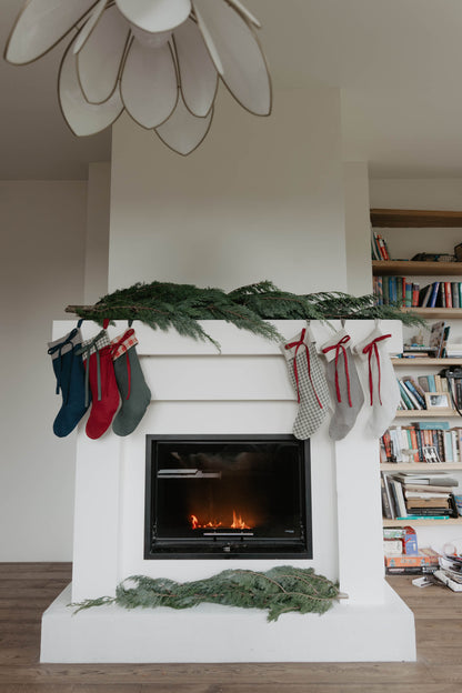 Linen Christmas Stocking with a festive bow detail