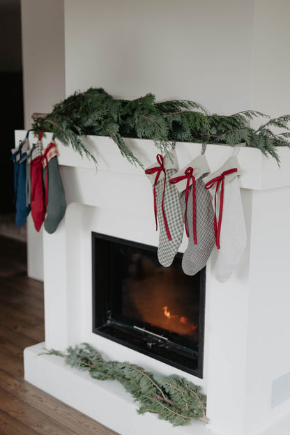 Linen Christmas Stocking with a festive bow detail