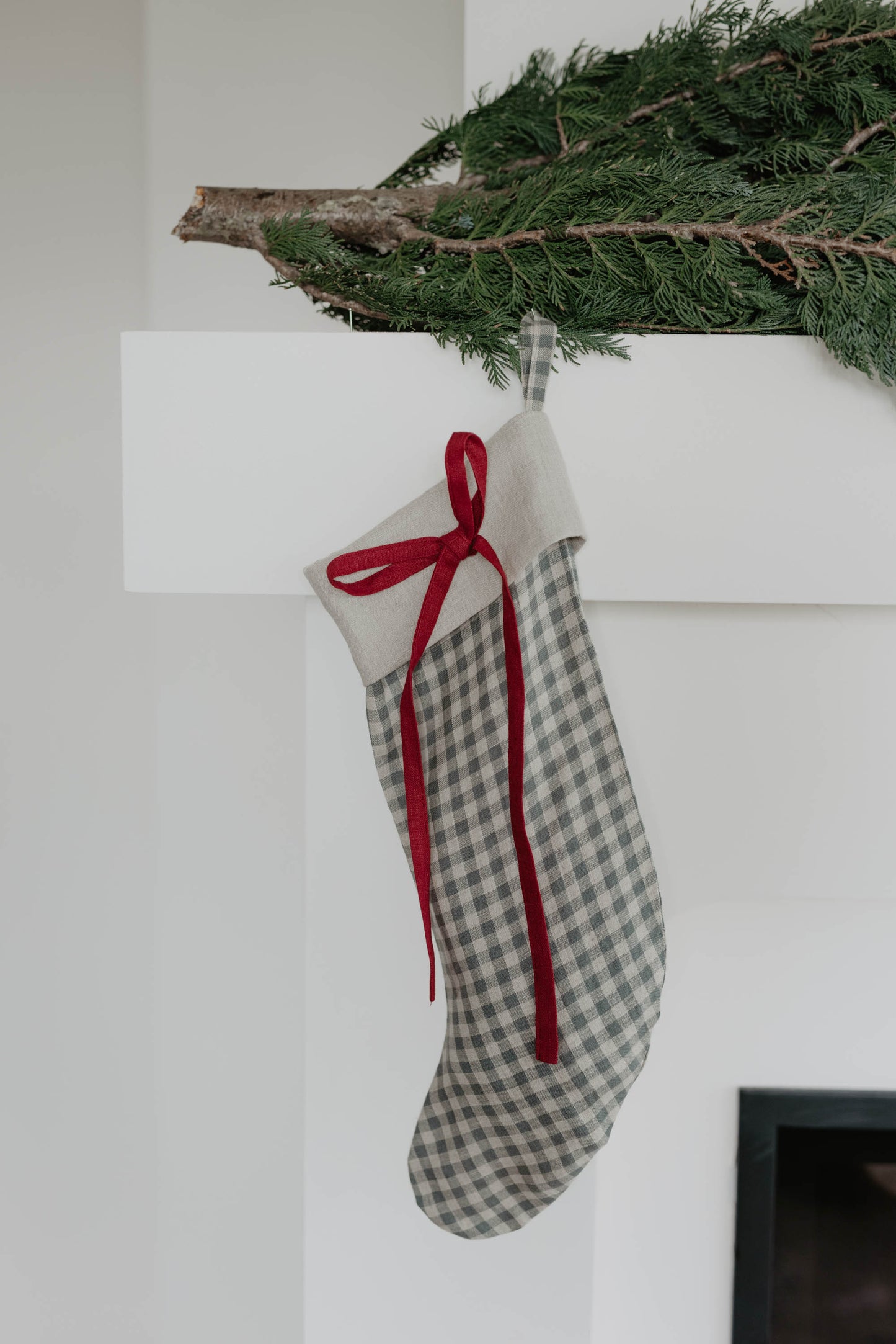 Linen Christmas Stocking with a festive bow detail
