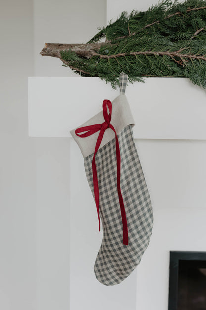 Linen Christmas Stocking with a festive bow detail