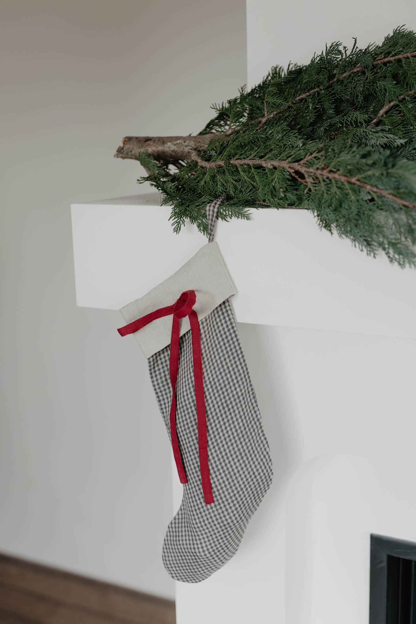 Linen Christmas Stocking with a festive bow detail
