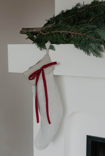 Linen Christmas Stocking with a festive bow detail