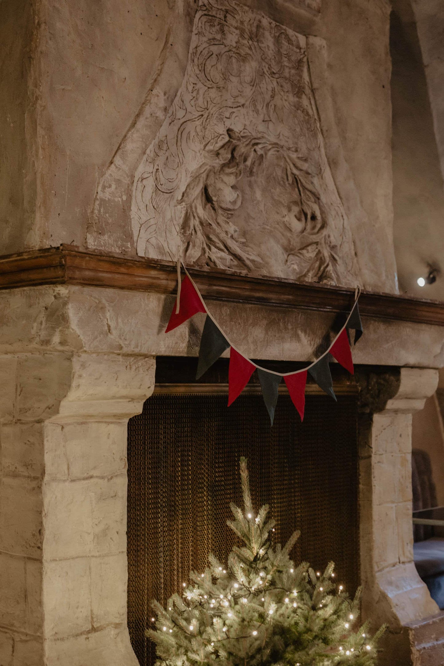 christmas linen bunting hung on chimney