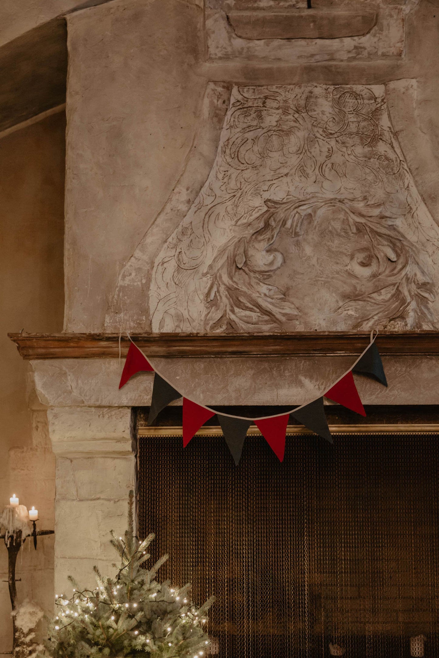 christmas linen bunting hung on chimney